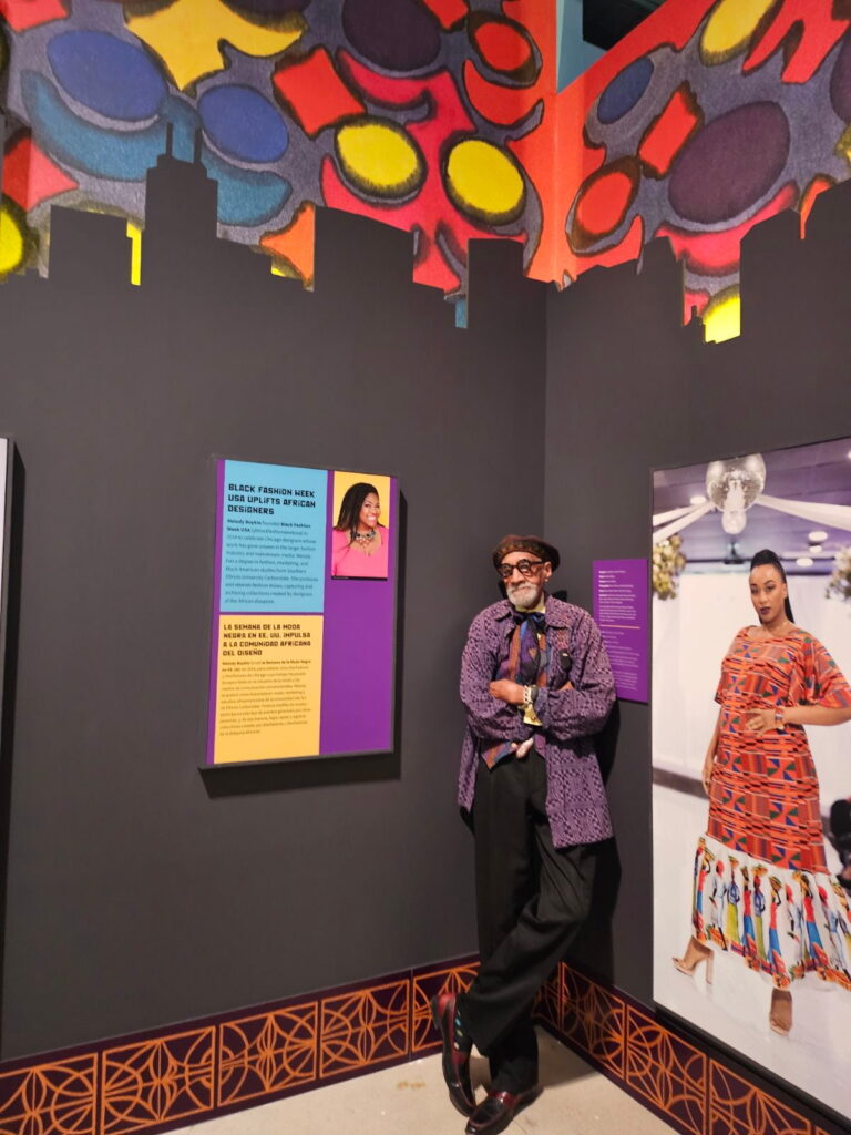 Robert Earl Paige at the BFW Wall Display at Connecting Threads exhibit