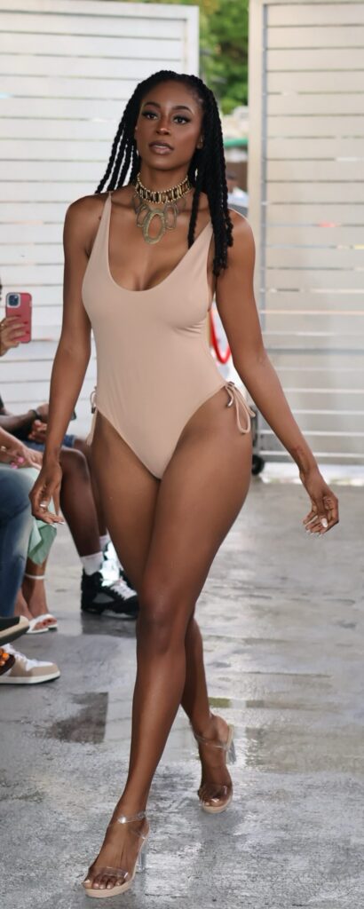 Photo courtesy of Bella Craze Designs Model wearing one-piece swimsuit by Bella Craze